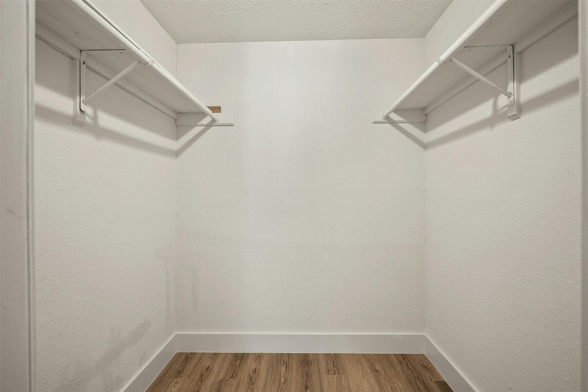 1910 Robbins Place, Unit 105 Austin, TX 78705 - Photo 24 of 30 Spacious walk-in closet with built-in shelving