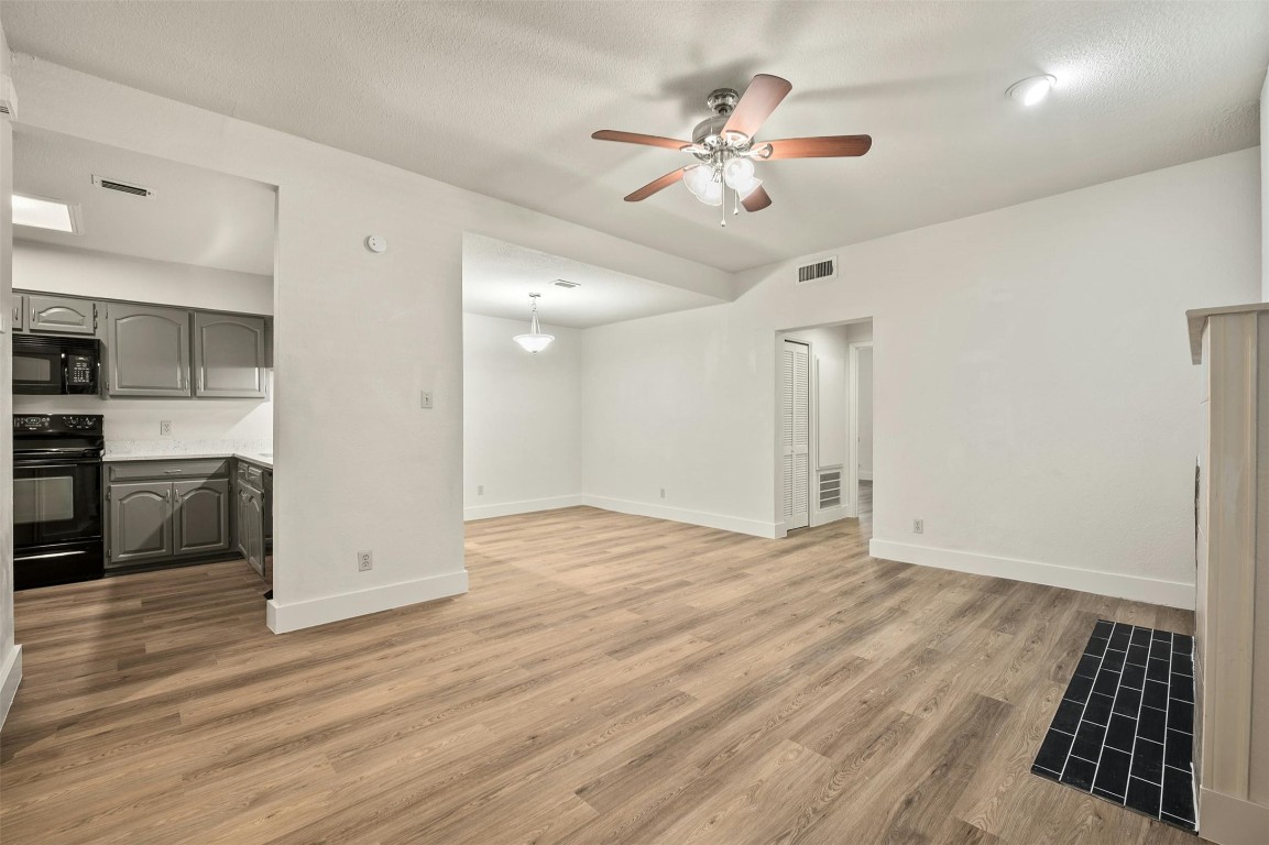 1910 Robbins Place, Unit 105 Austin, TX 78705 - Photo 7 of 30 Bright living room with open layout