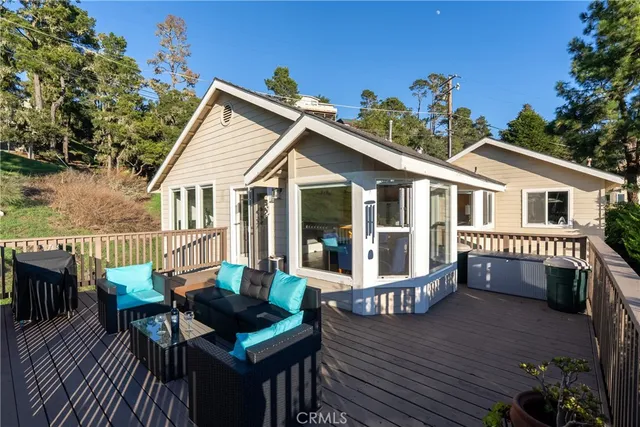 a view of a two chairs in the deck