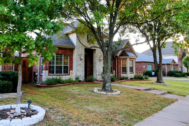 a front view of a house with a porch