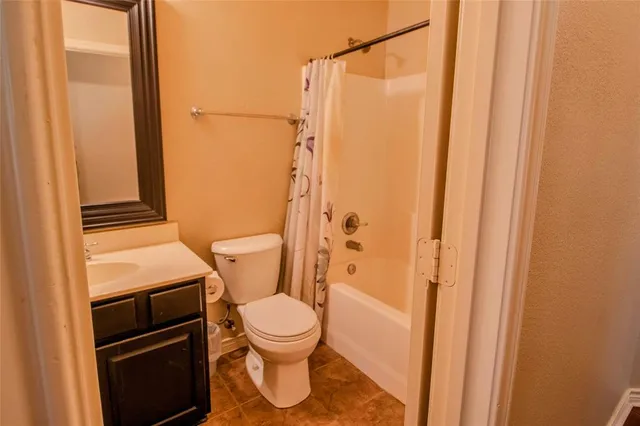 a view of a bathroom with a glass door