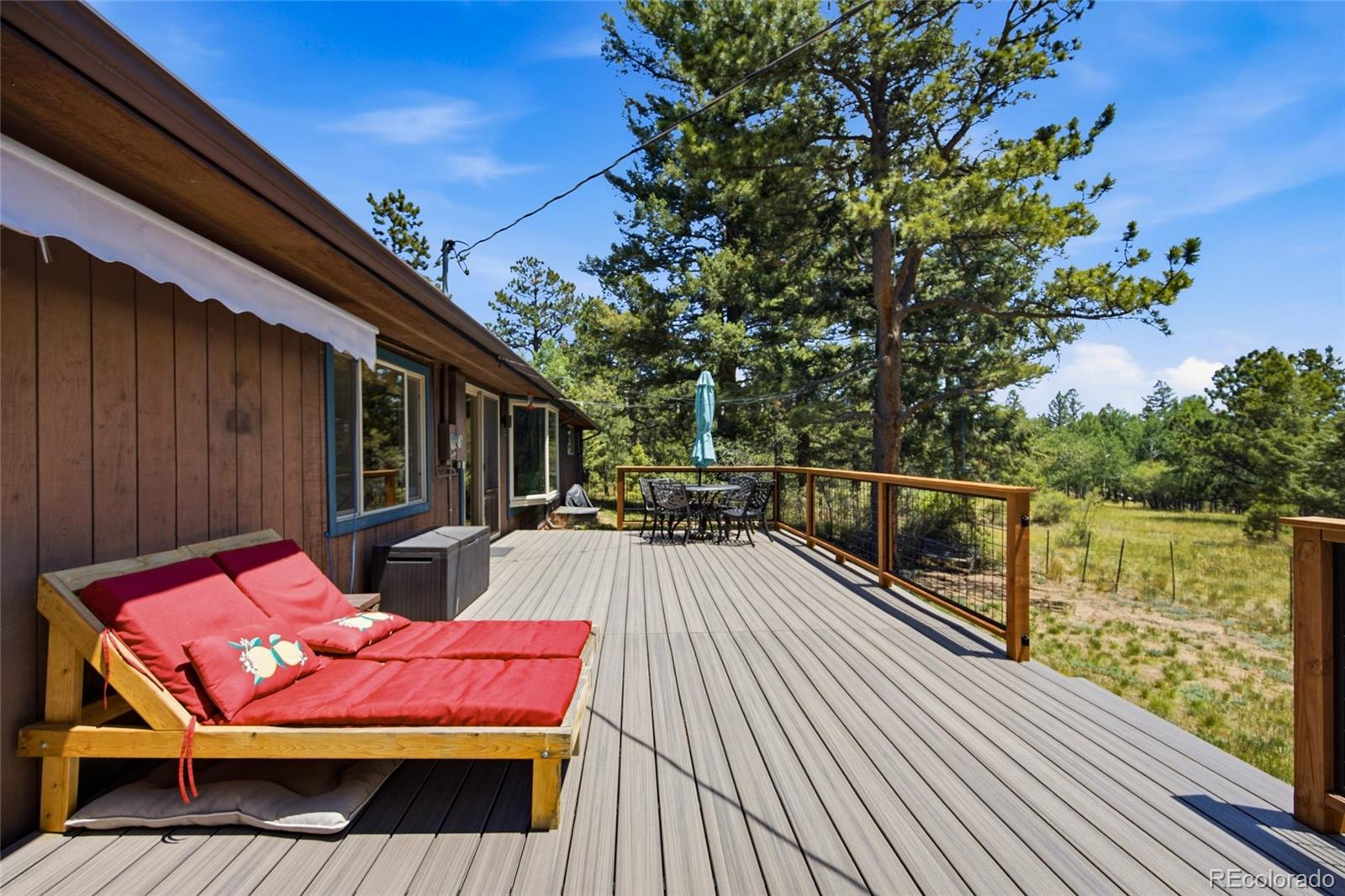 31280 Florence Road Conifer, CO 80433 - Photo 27 of 48 a view of deck with patio