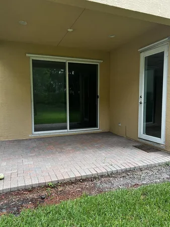a view of a house with backyard