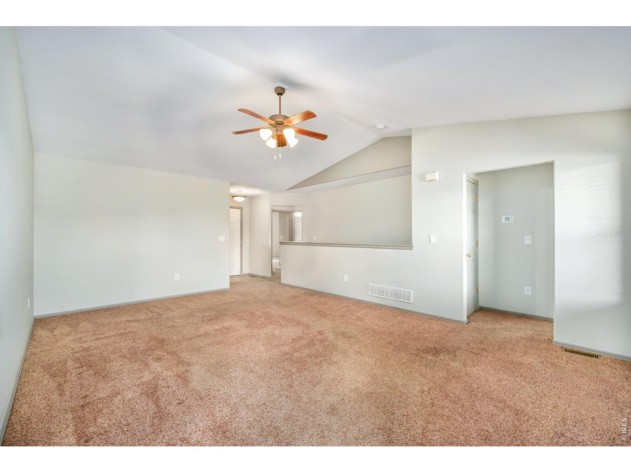17447 Margil Road Mead, CO 80542 - Photo 5 of 27 Vaulted ceilings and large living room
