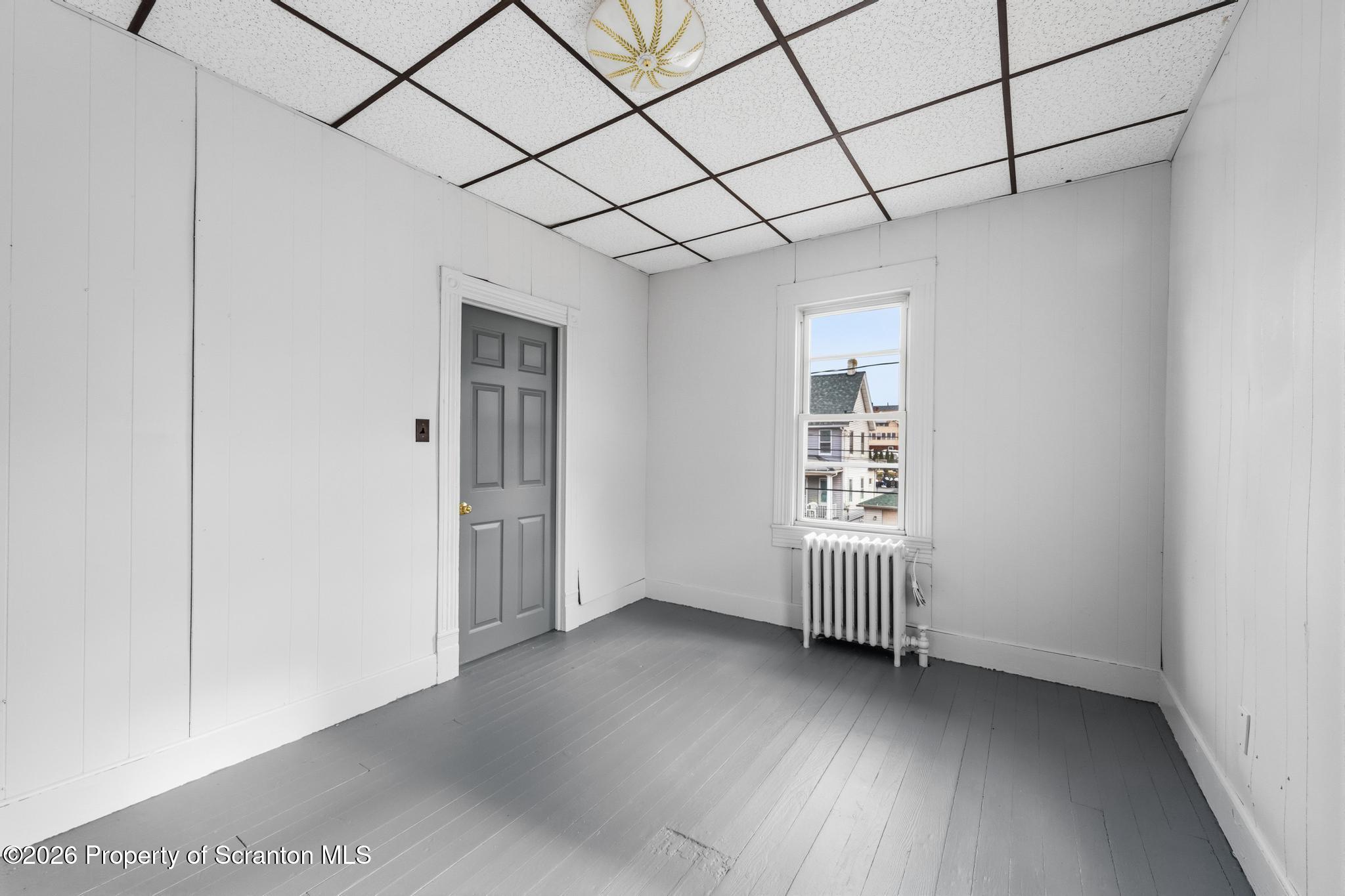 1413 Bulwer Street Scranton, PA 18504 - Photo 29 of 45 a view of empty room with windows