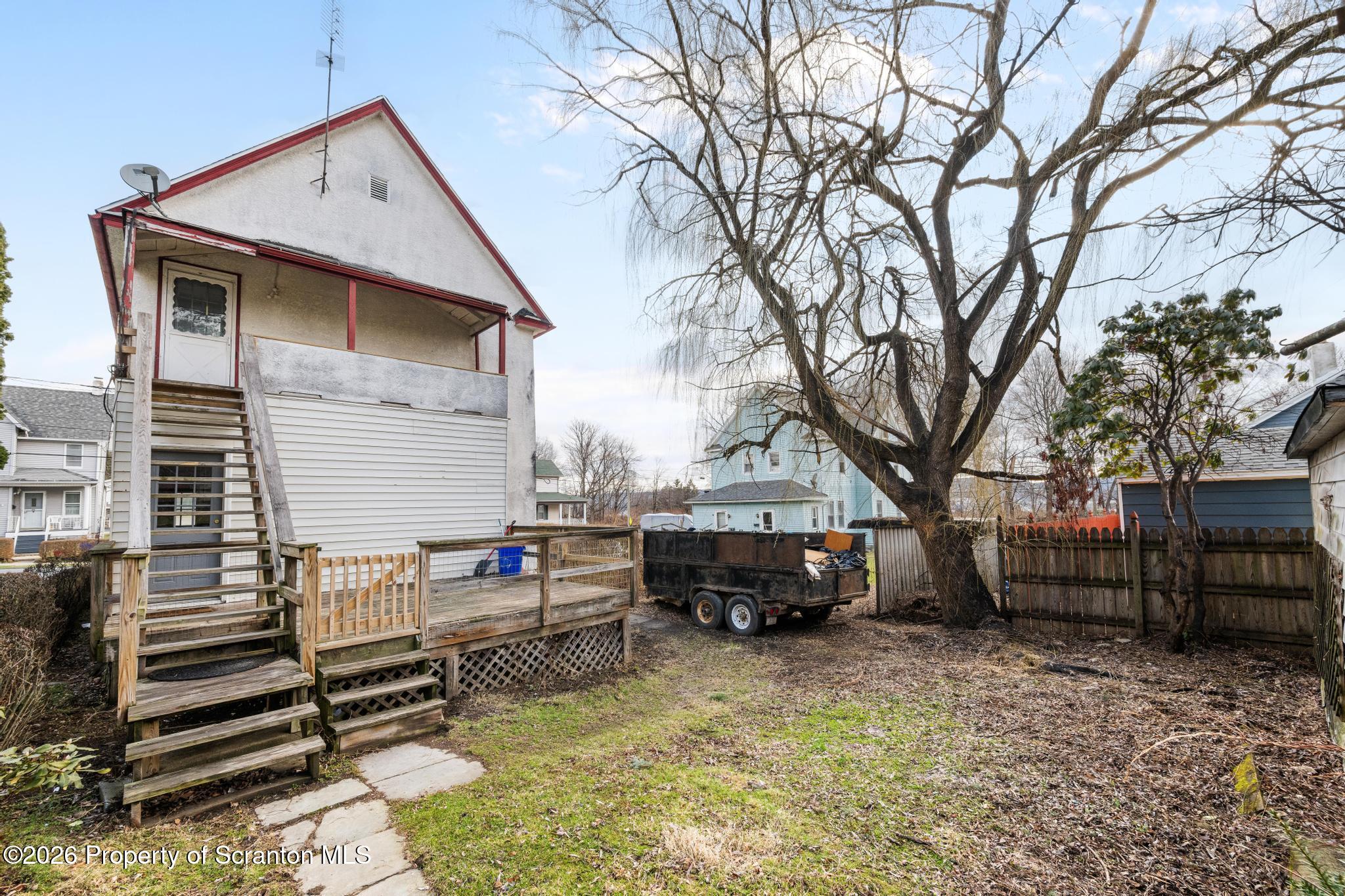 1413 Bulwer Street Scranton, PA 18504 - Photo 43 of 45 a front view of a house with cars parked