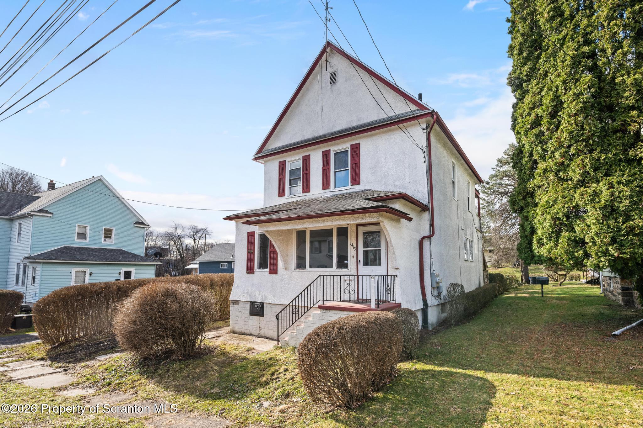1413 Bulwer Street Scranton, PA 18504 - Photo 45 of 45 a front view of a house with garden