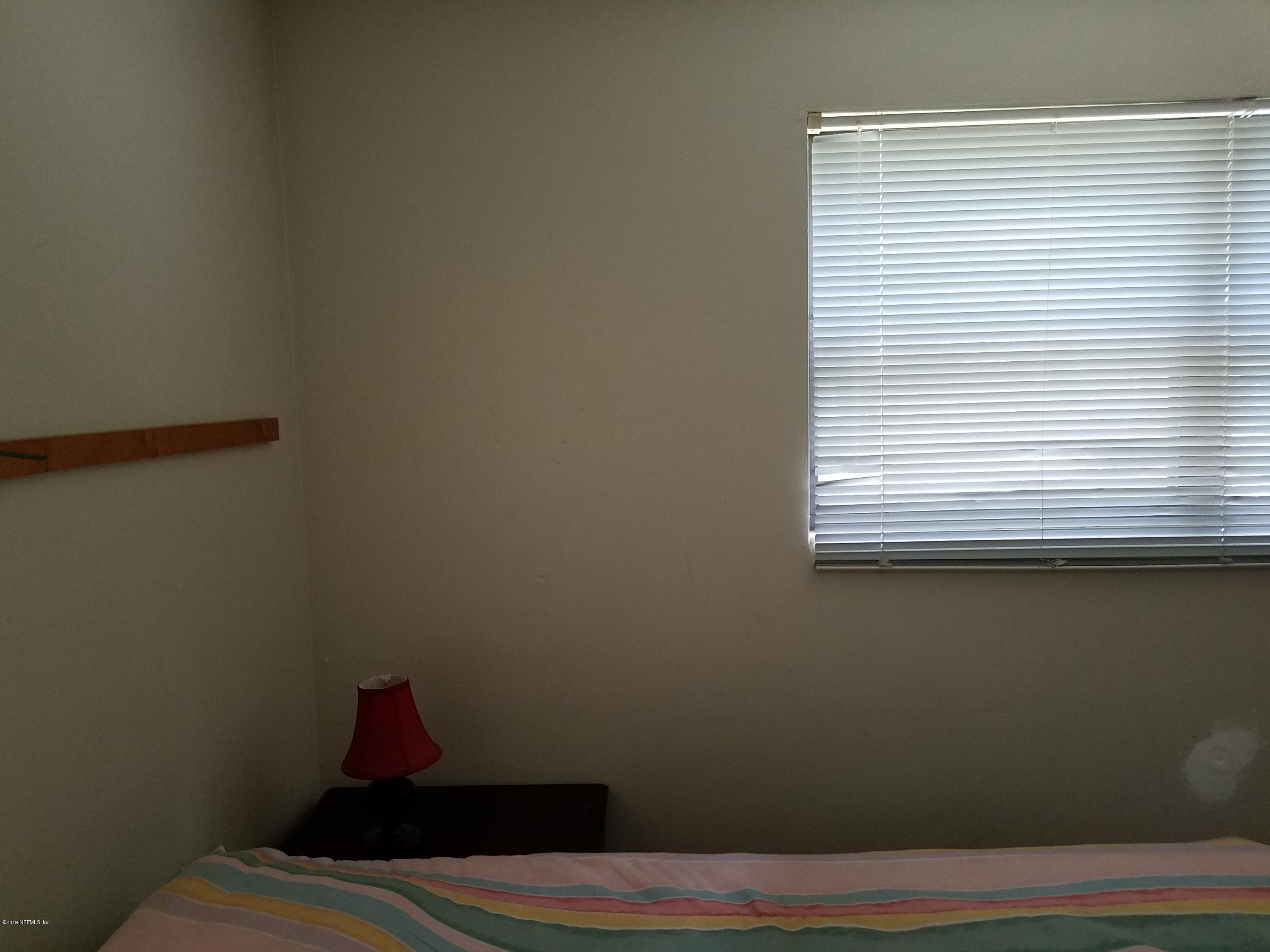 214 Southwest 40th Street Gainesville, FL 32607 - Photo 12 of 68 a view of a room that has a window