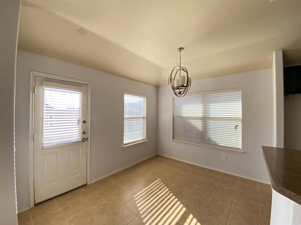 148 Meadow Crest Drive Princeton, TX 75407 - Photo 8 of 18 a view of an empty room with a window