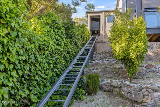 a spacious bedroom with a large bed and a flat screen tv