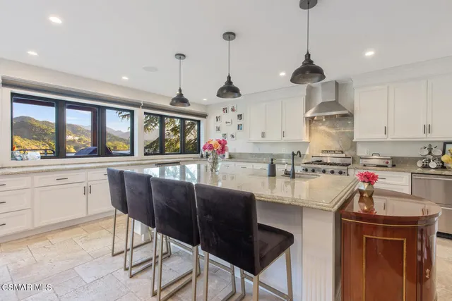a view of storage and utility room with cabinets