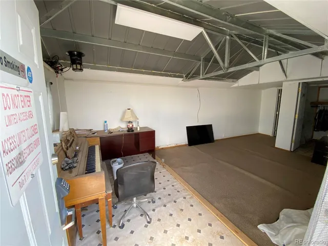 a white toilet sitting next to a shower