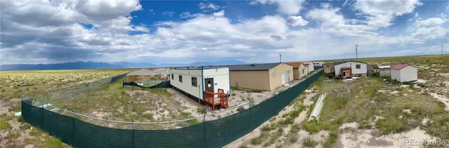 a house view with a garden space