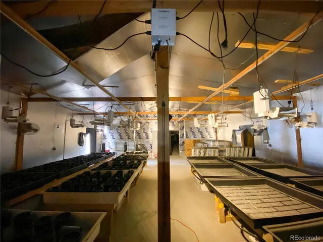a view of a parking garage with a bench