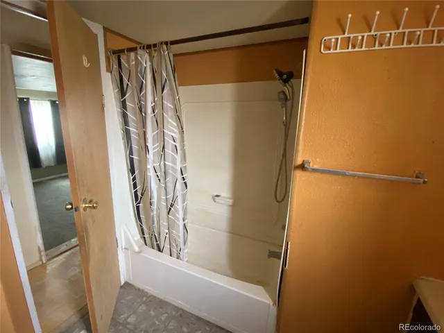 a view of backyard with cabin