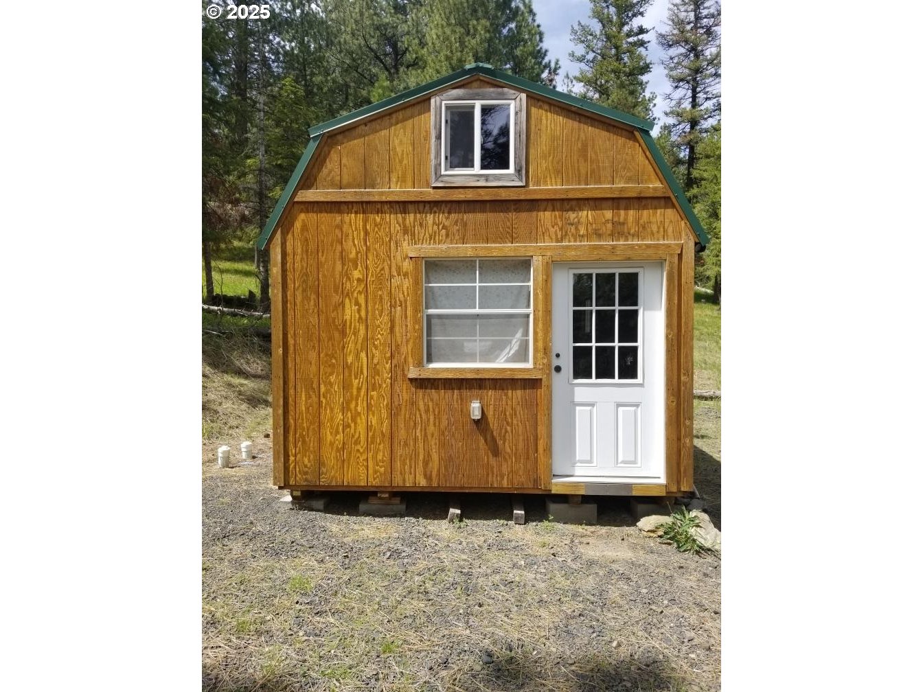 3300 Blake Ranch Road Heppner, OR 97836 - Photo 2 of 10 a view of a house with windows