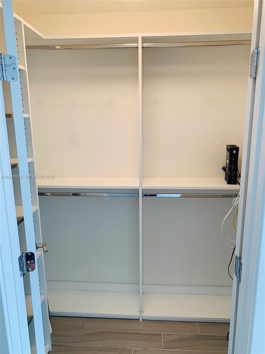 999 Southwest 1st Avenue, Unit 2310 Miami, FL 33130 - Photo 14 of 17 a close view of closet