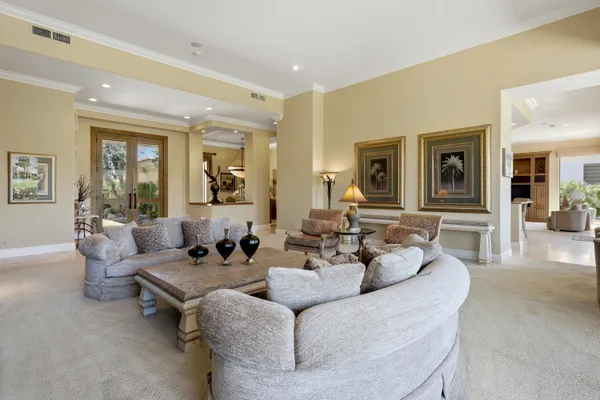 a view of a dining room with furniture window and outside view