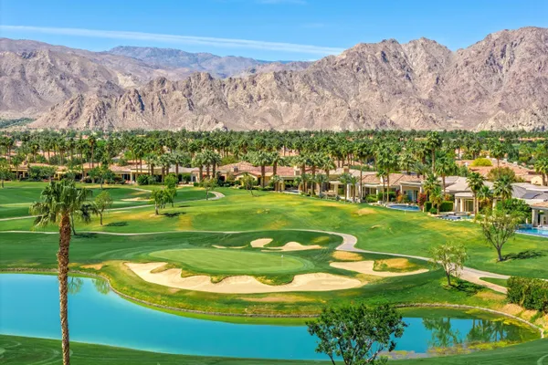 a view of a golf course with a garden
