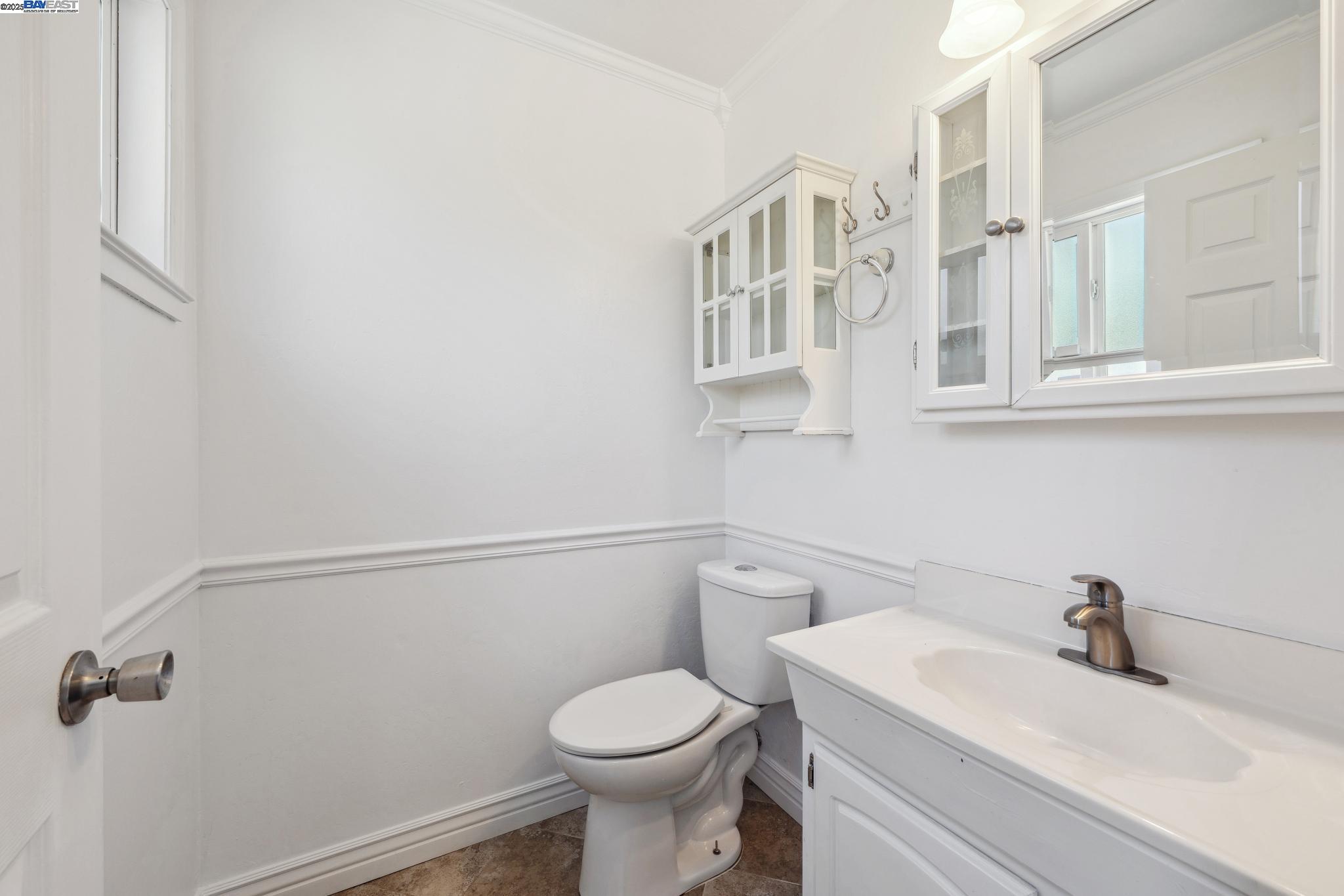 148 Spinnaker Pittsburg, CA 94565 - Photo 12 of 24 a bathroom with a sink and a toilet
