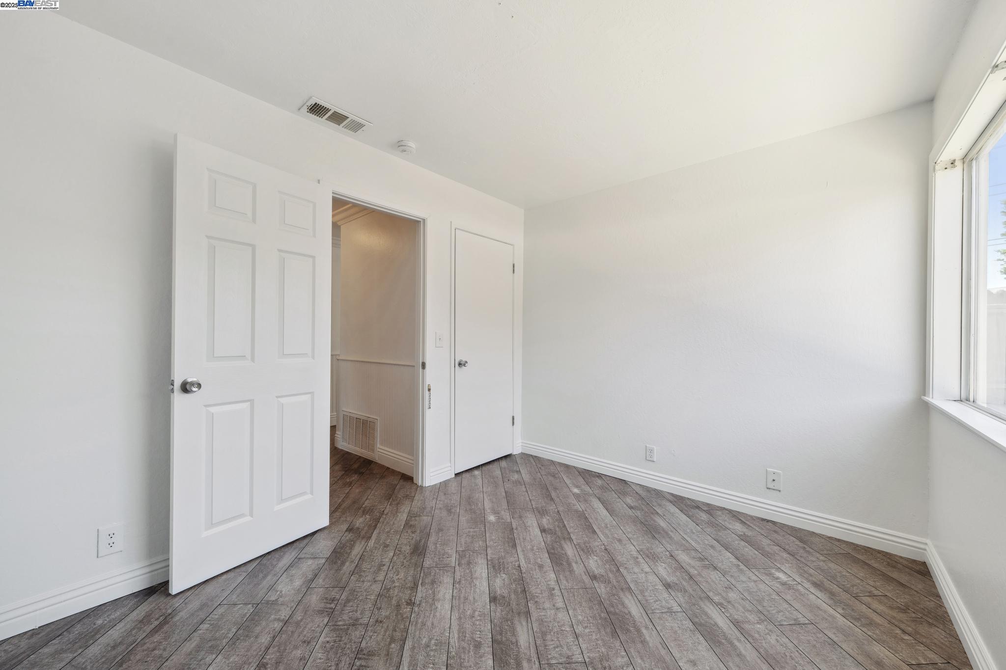 148 Spinnaker Pittsburg, CA 94565 - Photo 13 of 24 wooden floor in an empty room