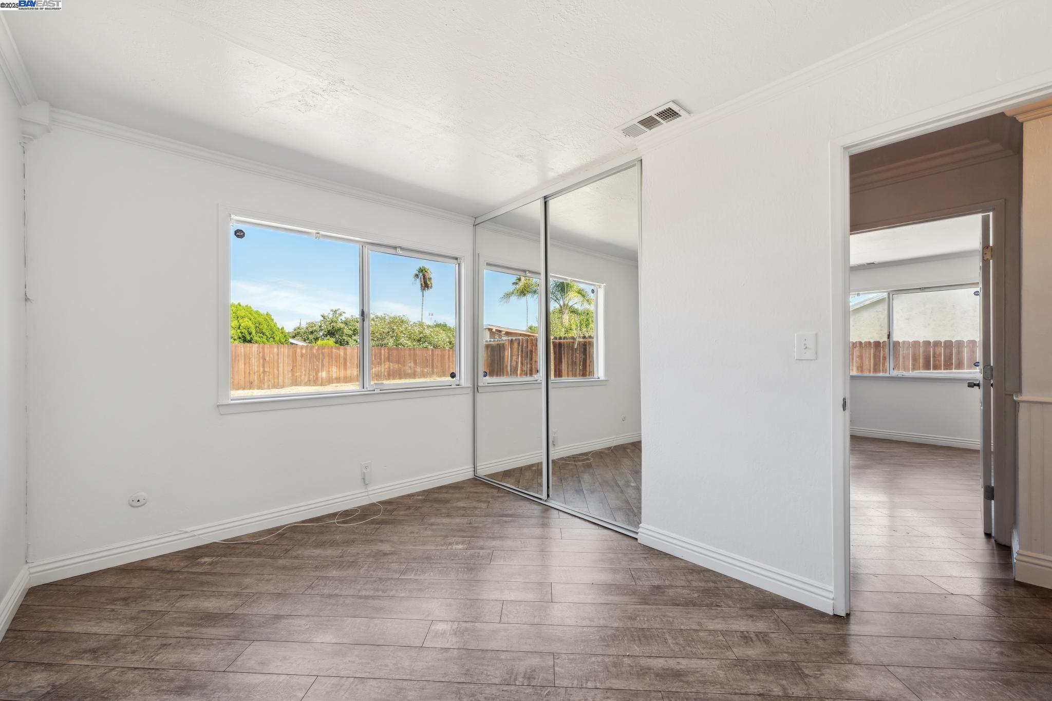 148 Spinnaker Pittsburg, CA 94565 - Photo 16 of 24 a view of an empty room with a window