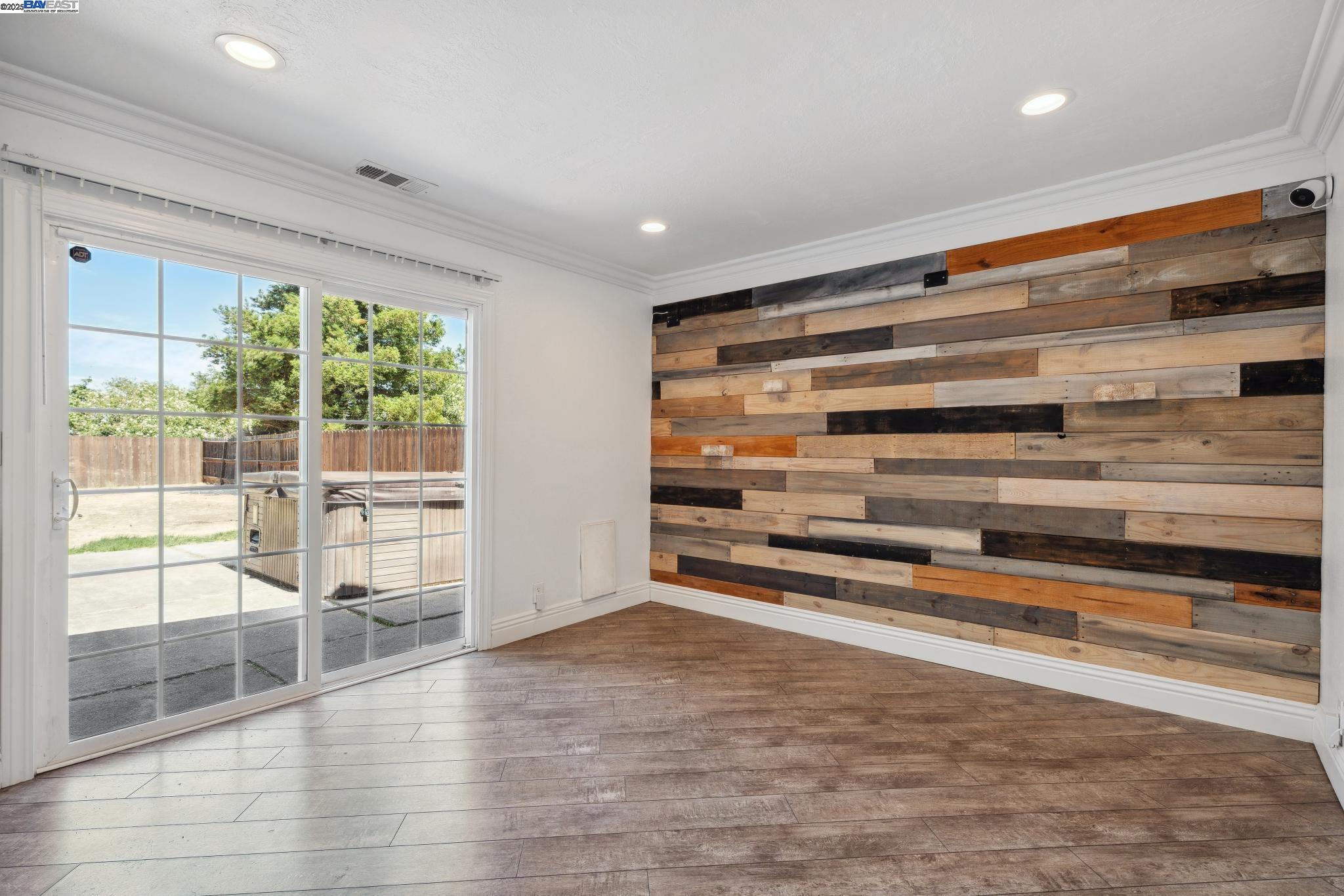 148 Spinnaker Pittsburg, CA 94565 - Photo 7 of 24 a view of room with wooden floor and windows