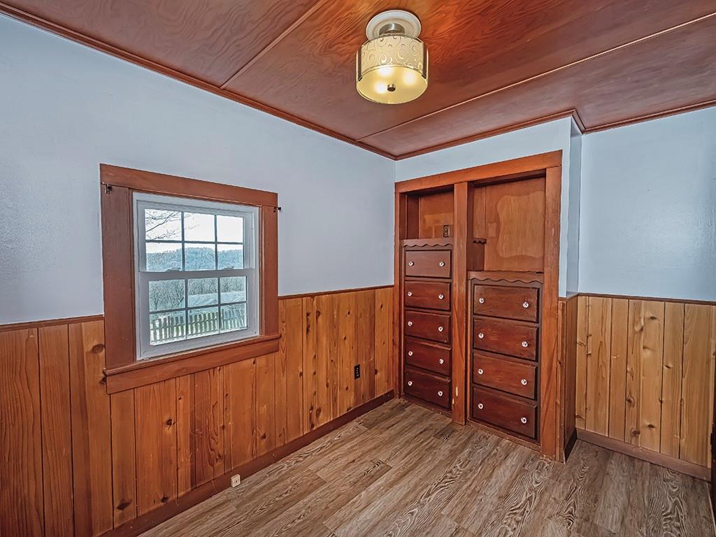 188 Thorn Run Road Butler, PA 16001 - Photo 19 of 25 an empty room with wooden floor and windows