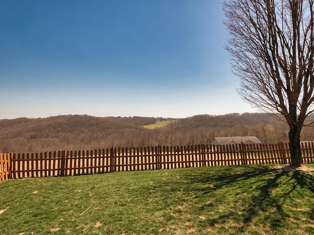 188 Thorn Run Road Butler, PA 16001 - Photo 24 of 25 a view of a garden with a fence