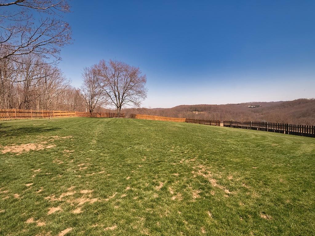 188 Thorn Run Road Butler, PA 16001 - Photo 5 of 25 a view of a lake from a yard