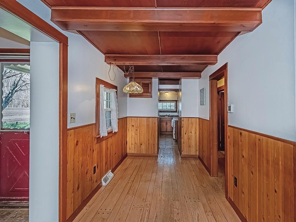 188 Thorn Run Road Butler, PA 16001 - Photo 10 of 25 a view of hallway with wooden floor