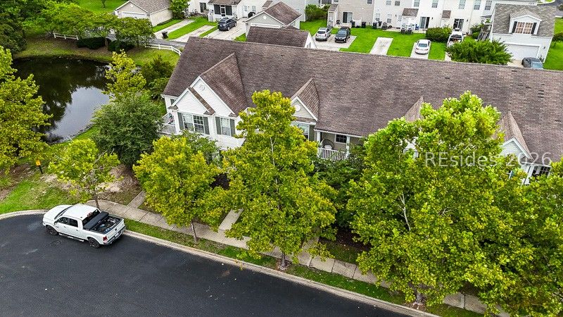 406 Park Side Way Bluffton, SC 29909 - Photo 12 of 39 Tree-lined streets showcase this beautiful home.