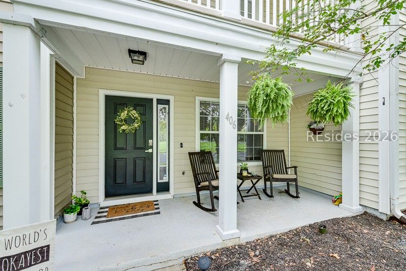 406 Park Side Way Bluffton, SC 29909 - Photo 4 of 39 Covered porch is a charming space for relaxation.