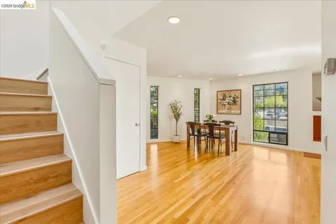 a view of dining room with furniture and window