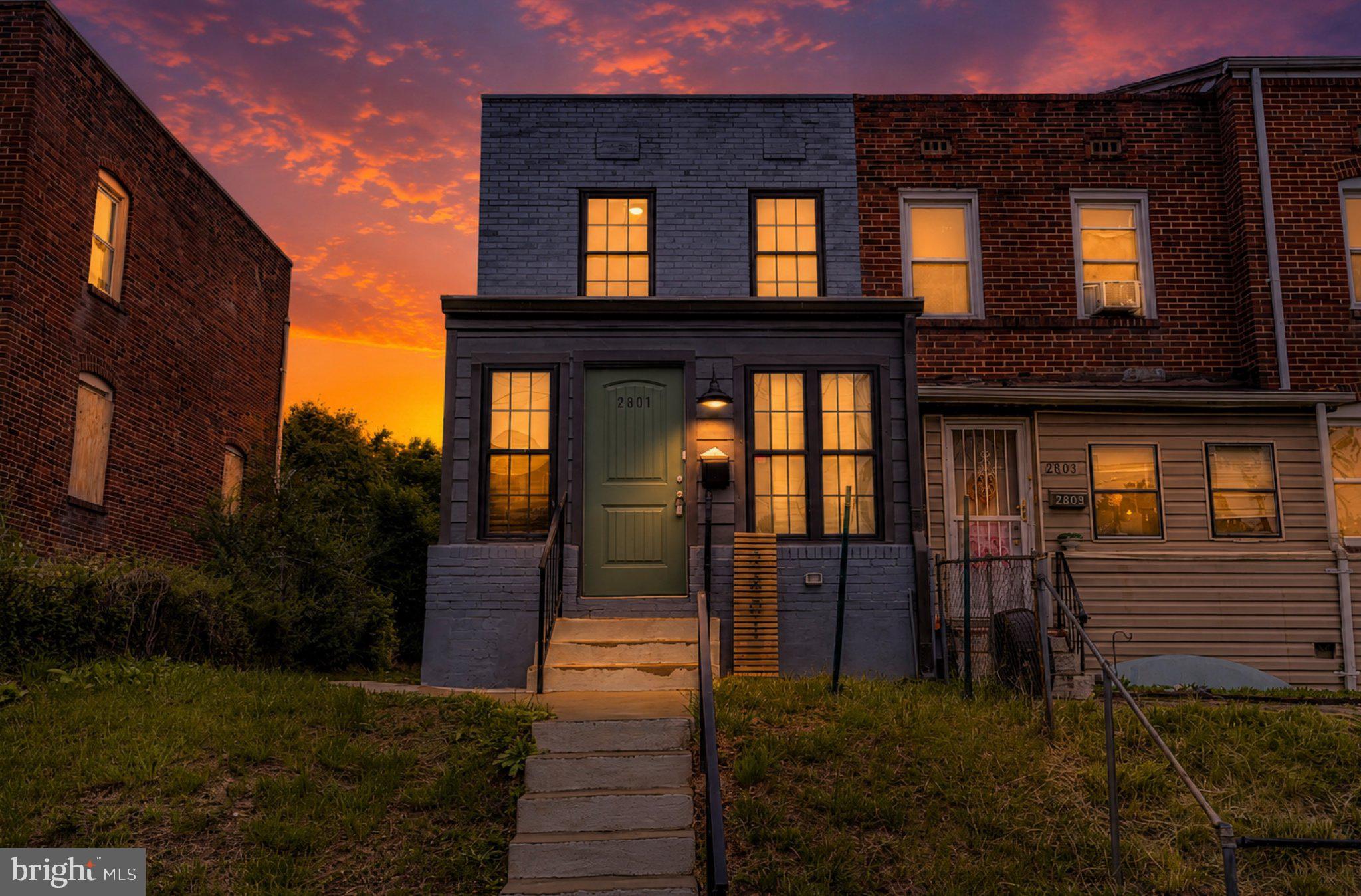 2801 Round Road Baltimore, MD 21225 - Photo 29 of 29 a view of a brick house with many windows