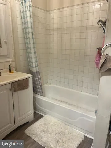 a bathroom with a sink and a bathtub