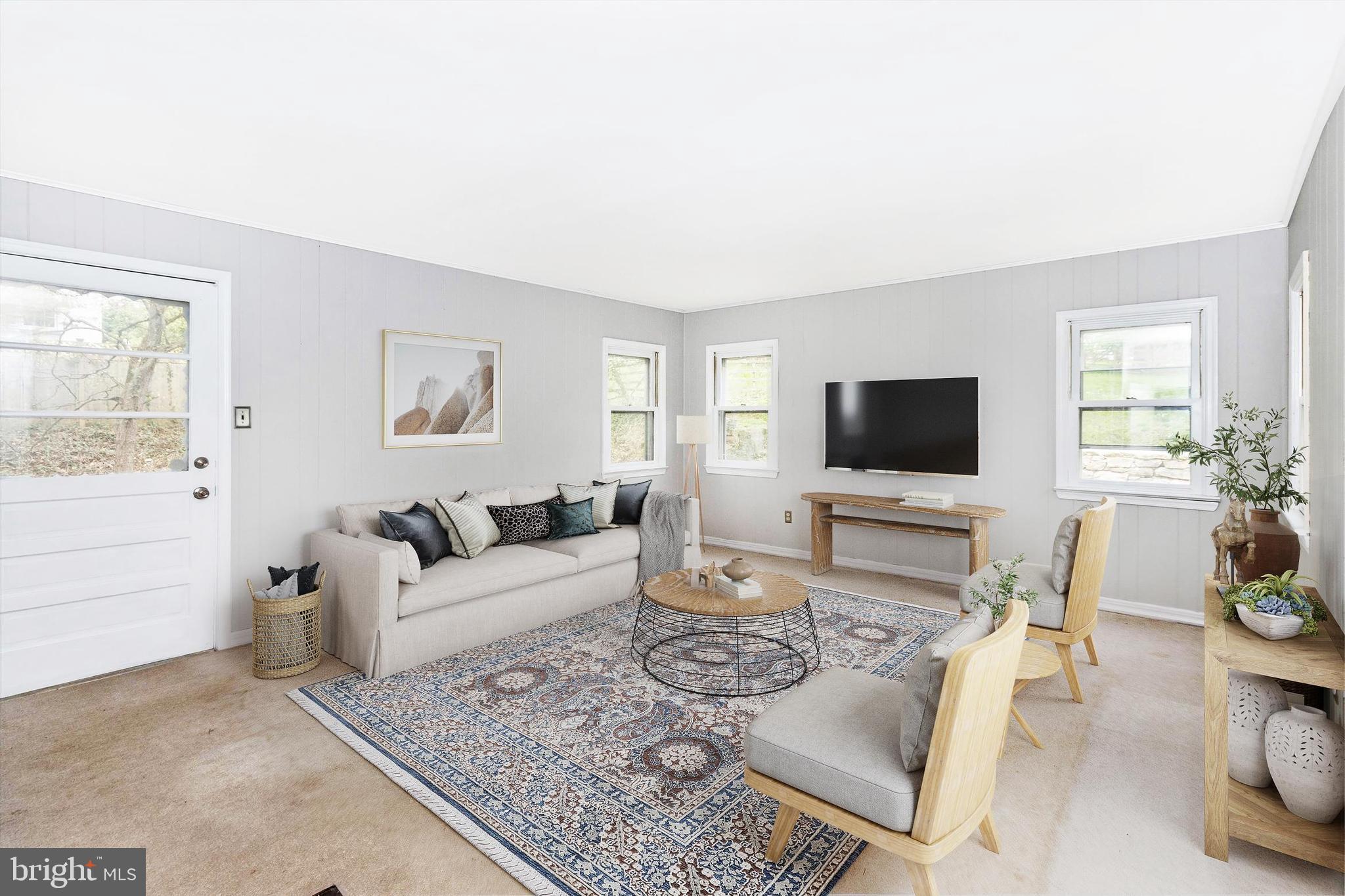 414 Devon State Road Devon, PA 19333 - Photo 13 of 31 a living room with furniture and a flat screen tv