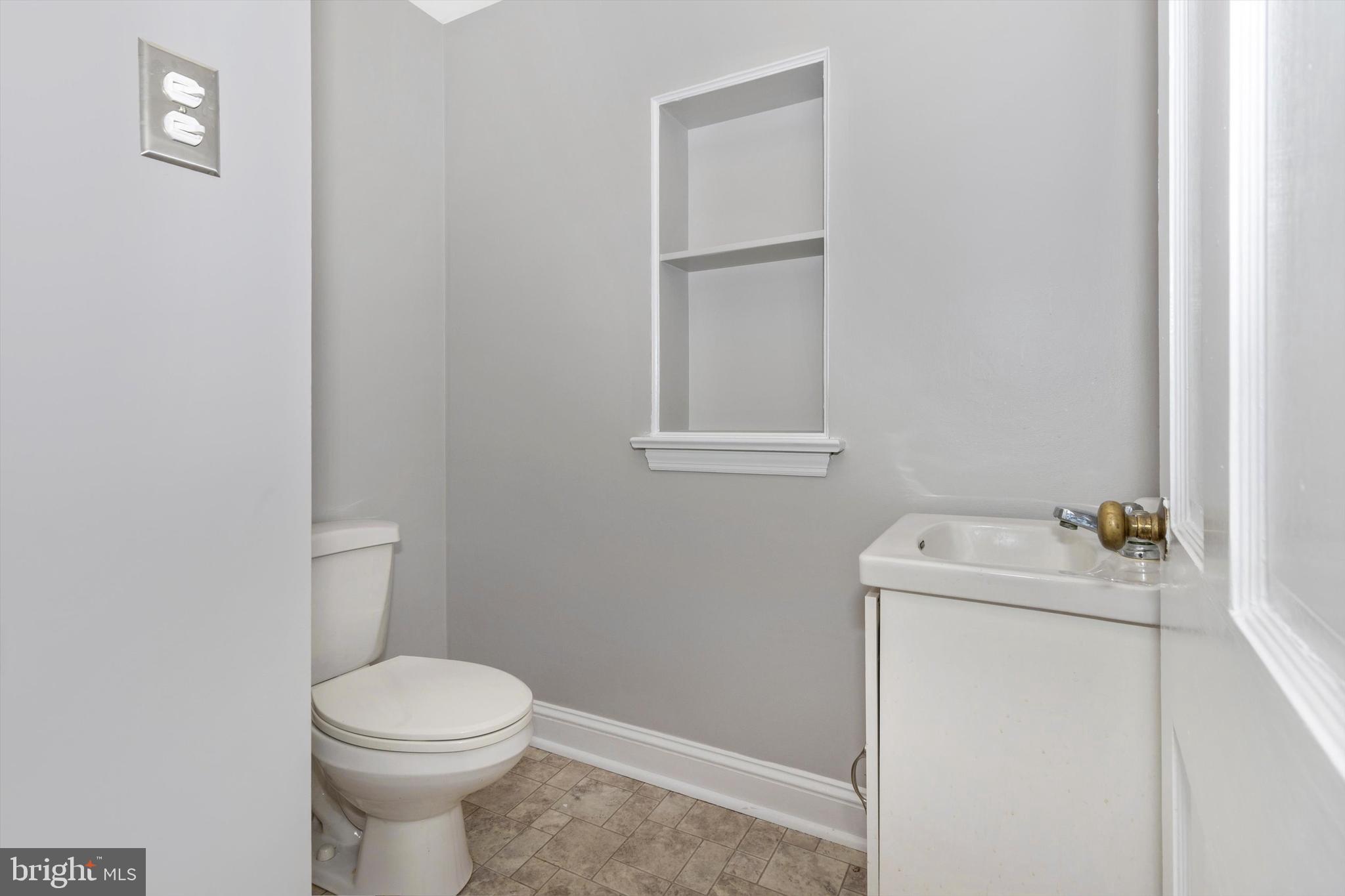 414 Devon State Road Devon, PA 19333 - Photo 15 of 31 a bathroom with a sink toilet and vanity