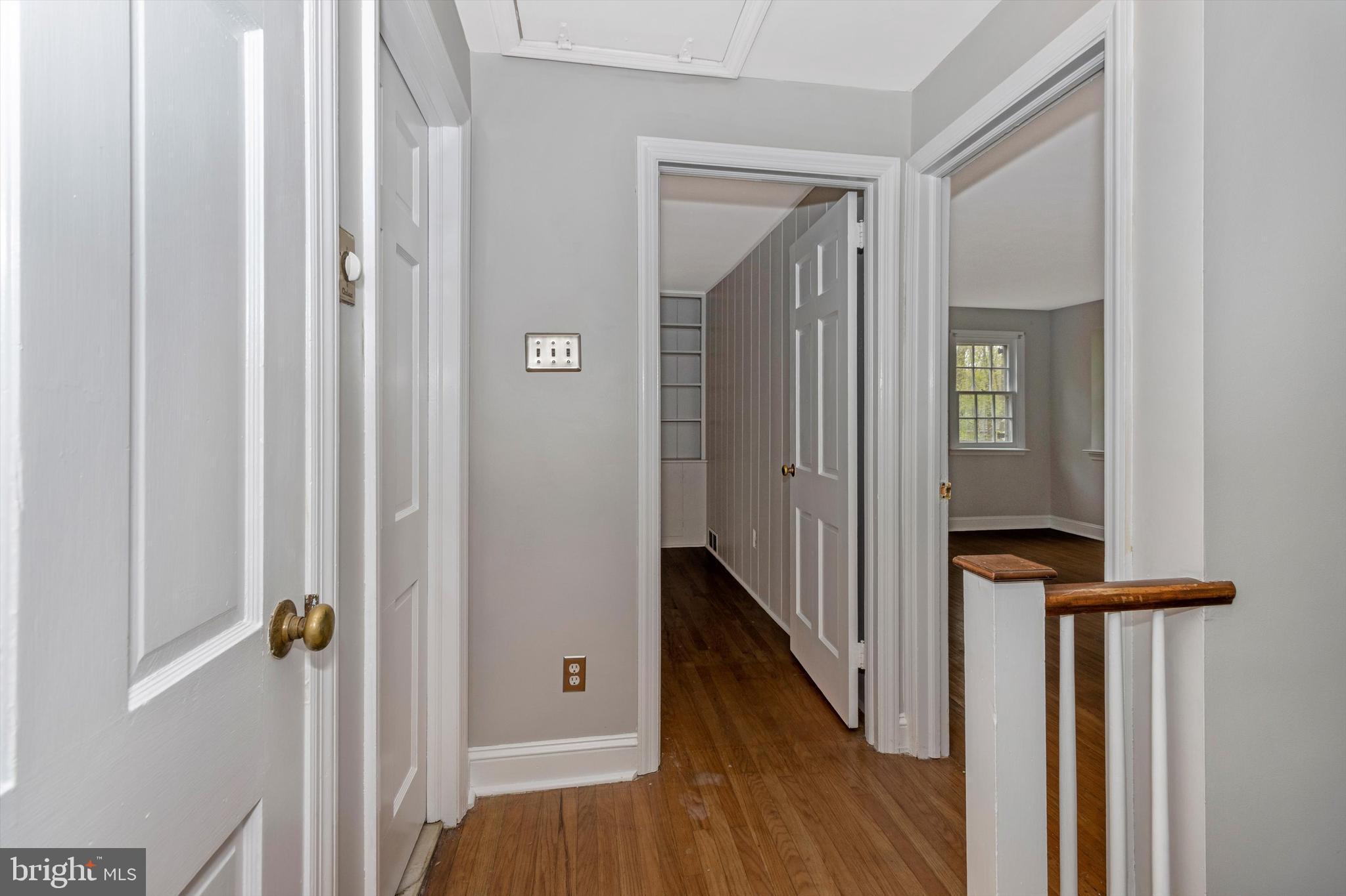 414 Devon State Road Devon, PA 19333 - Photo 17 of 31 a view of a hallway with wooden floor and staircase