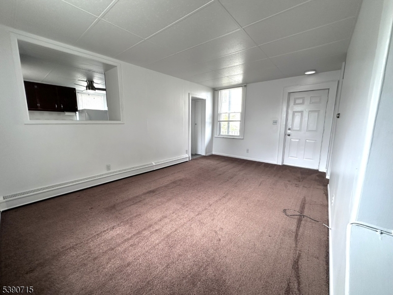 89 Getty Avenue, Unit 3 Clifton, NJ 07011 - Photo 12 of 28 an empty room with windows