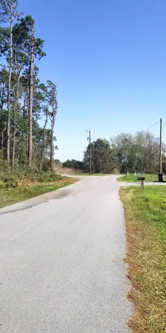 a view of a lake with a big yard