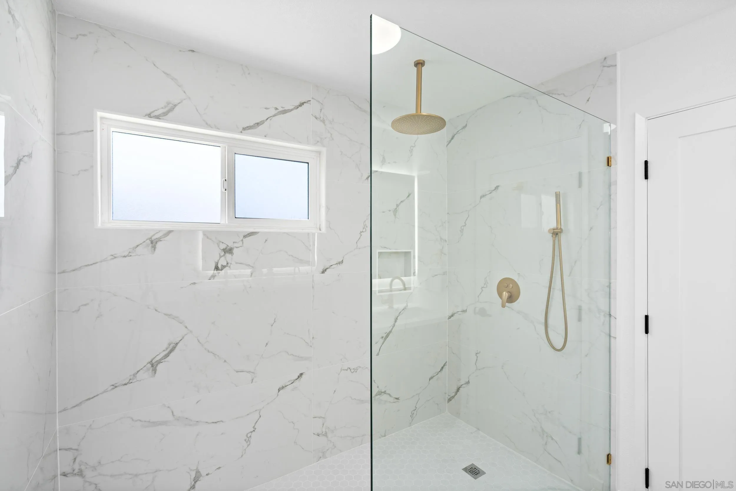 1621 Downs Street Oceanside, CA 92054 - Photo 24 of 38 a bathroom with a shower