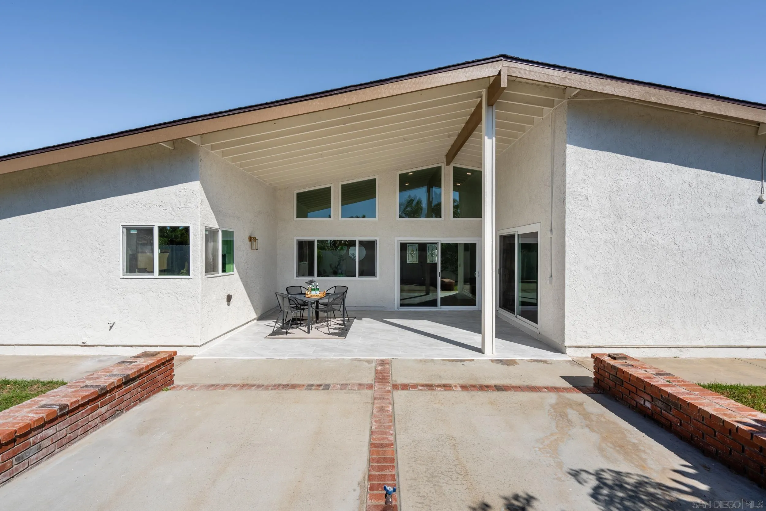 1621 Downs Street Oceanside, CA 92054 - Photo 31 of 38 a backyard of a house with table and chairs