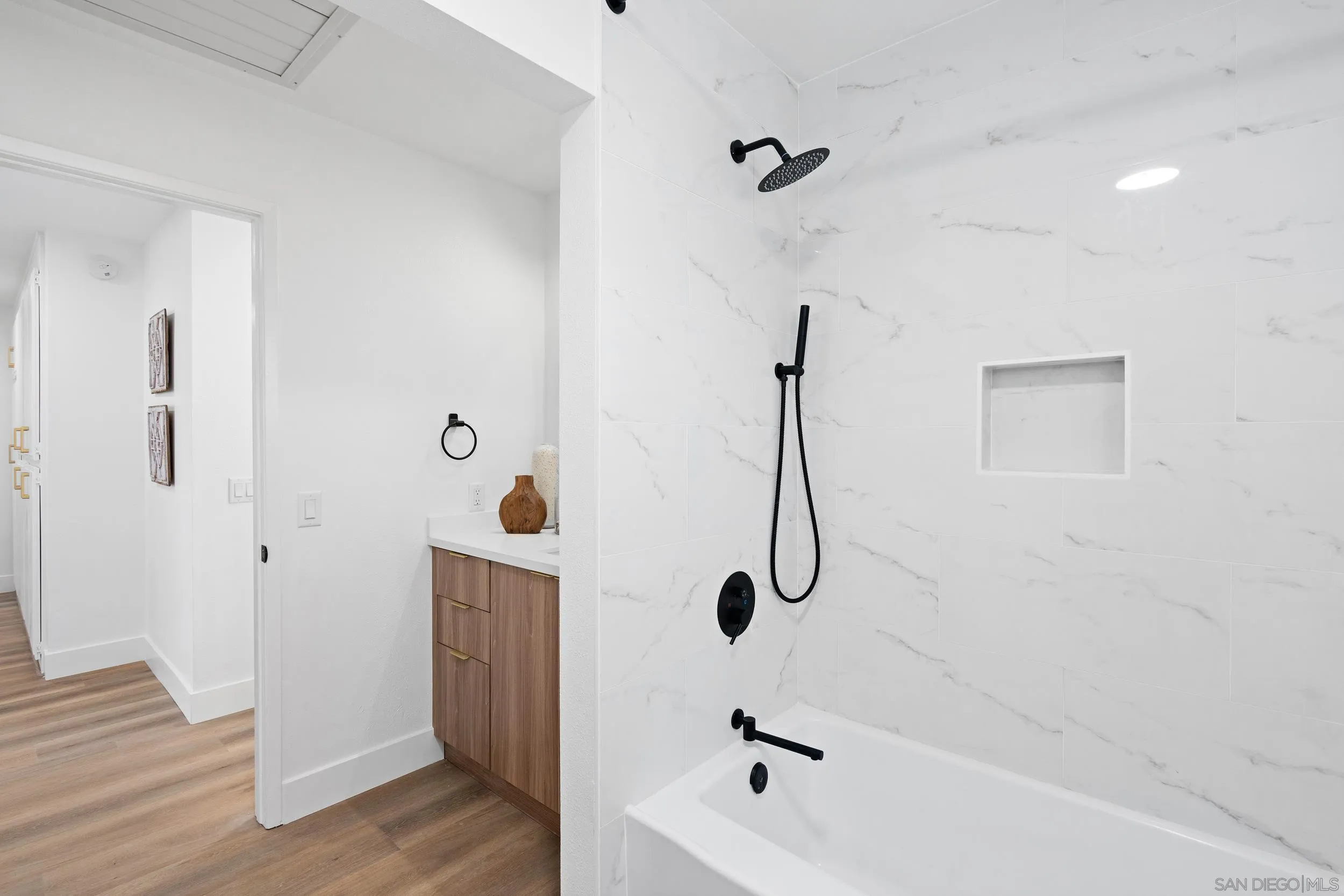 1621 Downs Street Oceanside, CA 92054 - Photo 9 of 38 a bathroom with a bathtub and shower