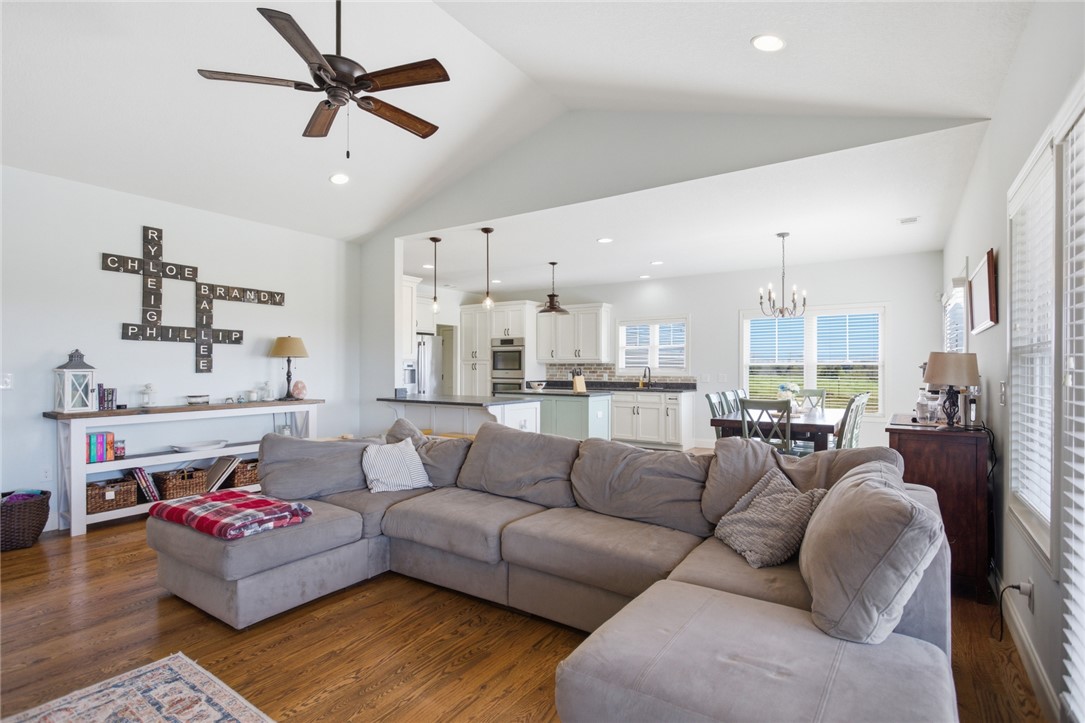 426 Oak Creek Road Seneca, SC 29678 - Photo 5 of 50 Bright and open living space with hardwood floors seamlessly connecting to the kitchen and dining area.