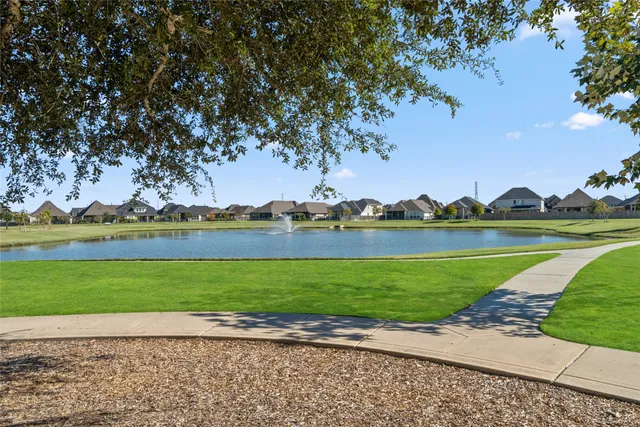 a view of a lake with a big yard
