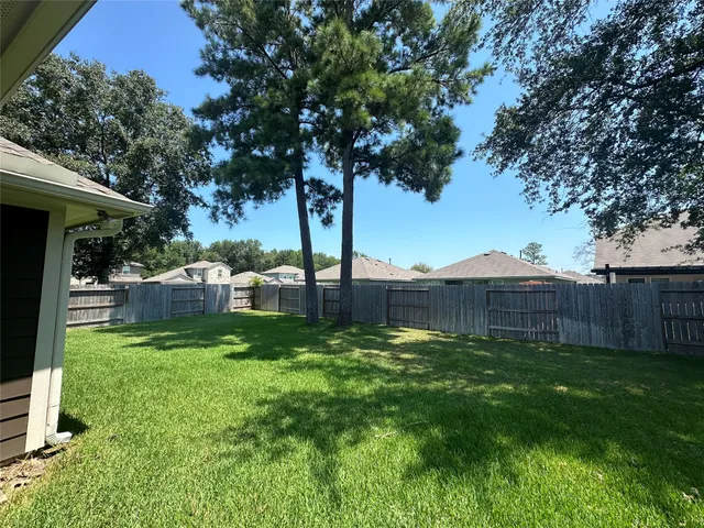 a view of a backyard of a house