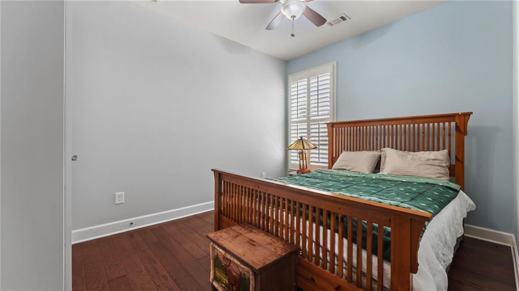 3418 Locust Cove Road Gainesville, GA 30504 - Photo 17 of 61 a bedroom with a bed and a window