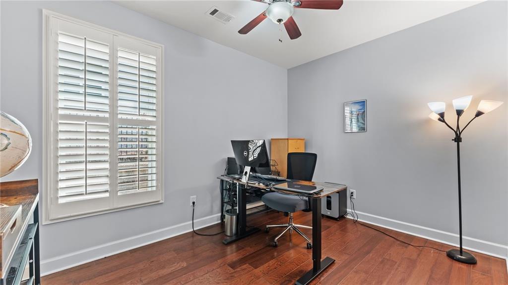3418 Locust Cove Road Gainesville, GA 30504 - Photo 19 of 61 a view of a workspace with furniture and a window