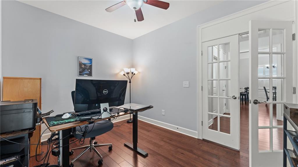 3418 Locust Cove Road Gainesville, GA 30504 - Photo 20 of 61 a view of a workspace with furniture and a window